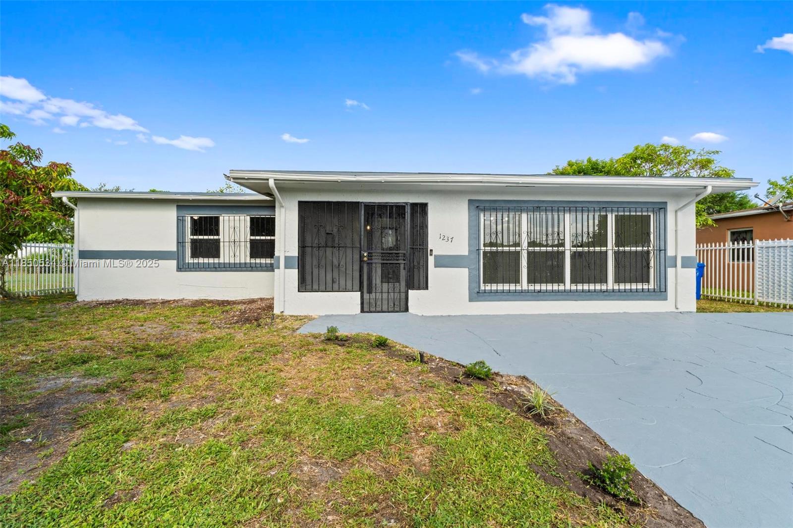 Beautifully remodeled single-family home in Fort Lauderdale featuring a spacious open layout and a private, fully fenced backyard. This home has been completely renovated, including the bathrooms and kitchen. The modern kitchen is equipped with state-of-the-art appliances and sleek granite countertops, perfect for everyday living and entertaining. Both bathrooms have been tastefully updated with contemporary finishes. The primary suite includes a walk-in closet, and there’s ample storage space throughout. The converted garage offers a large flex space with its own private entrance—ideal for a home office, playroom, or guest area. Conveniently located near I-95. Please note: washer and dryer are not included in the sale.