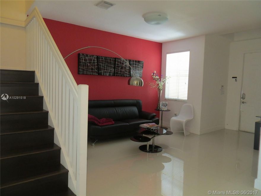 ENJOY LIVING IN DORAL IN THIS BEAUTIFUL REMODELED TOWNHOME WITH LAKE VIEW FROIM EVERY AREA OF THE HOUSE. FENCED PATIO, 3 BEDROOMS, 2 FULL BATHS, GUEST BATH, CONVENIENTLY LOCATED NEAR KIDS PARK WALKING DISTANCE FOR THE CLUB HOUSE WITH ALL AMENITIES INCLUDED AND NEW CULTURAL CENTER. SPECIAL FEATURES AS WOOD FLOOR THROUGHOUT 2ND FLOOR AND STAIRS, PORCELANATO ON 1ST FLOOR, KITCHEN WITH STAINLESS STEEL APPLIANCES AND GRANITE COUNTERTOP.