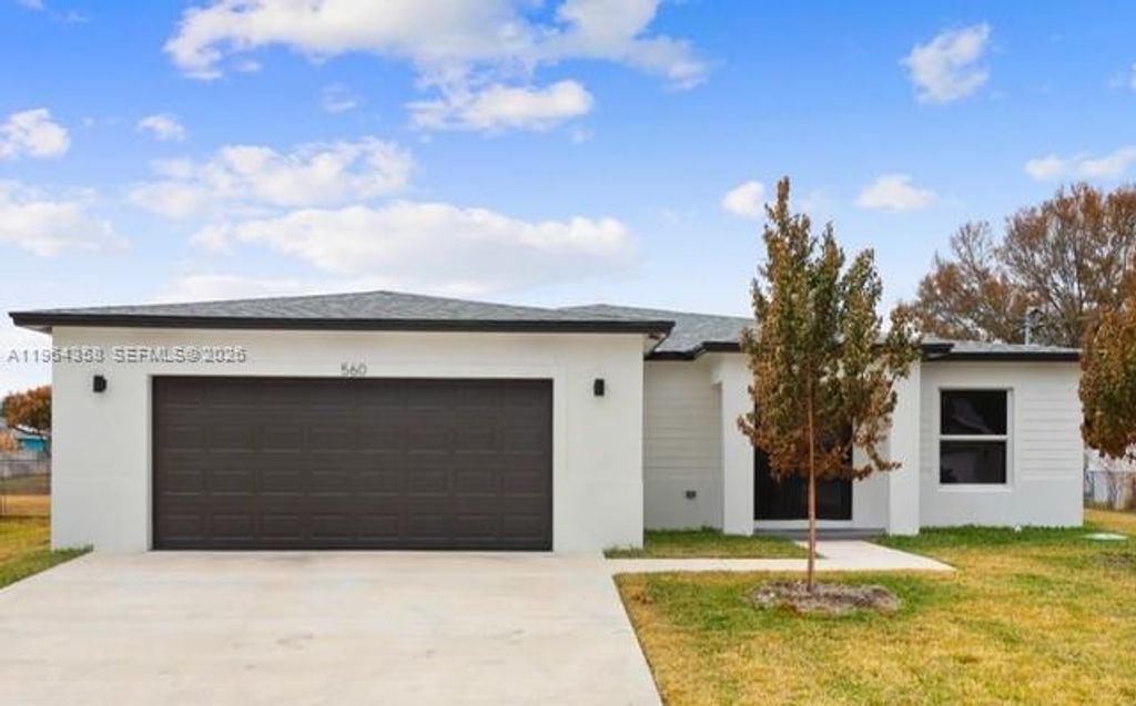 Photo of 560 SW Carter Ave, Port St Lucie, FL 34983 (MLS # A11964358)