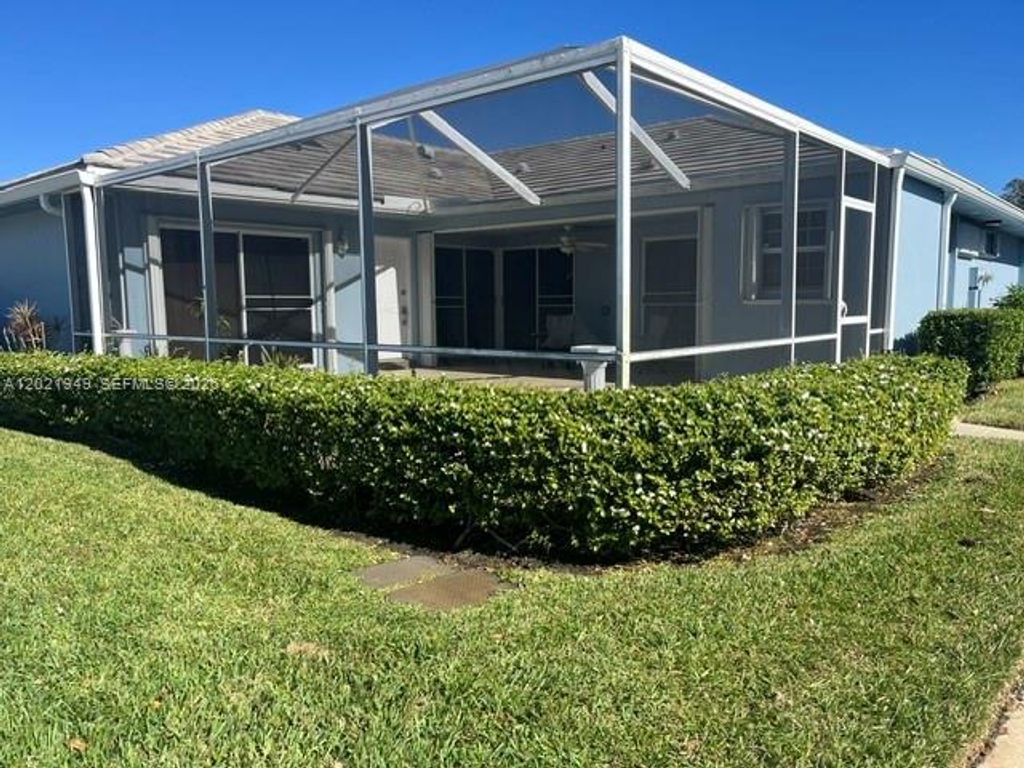 Photo of 1215 NW Sun Terrace Cir, Port St Lucie, FL 34986 (MLS # A12021949)