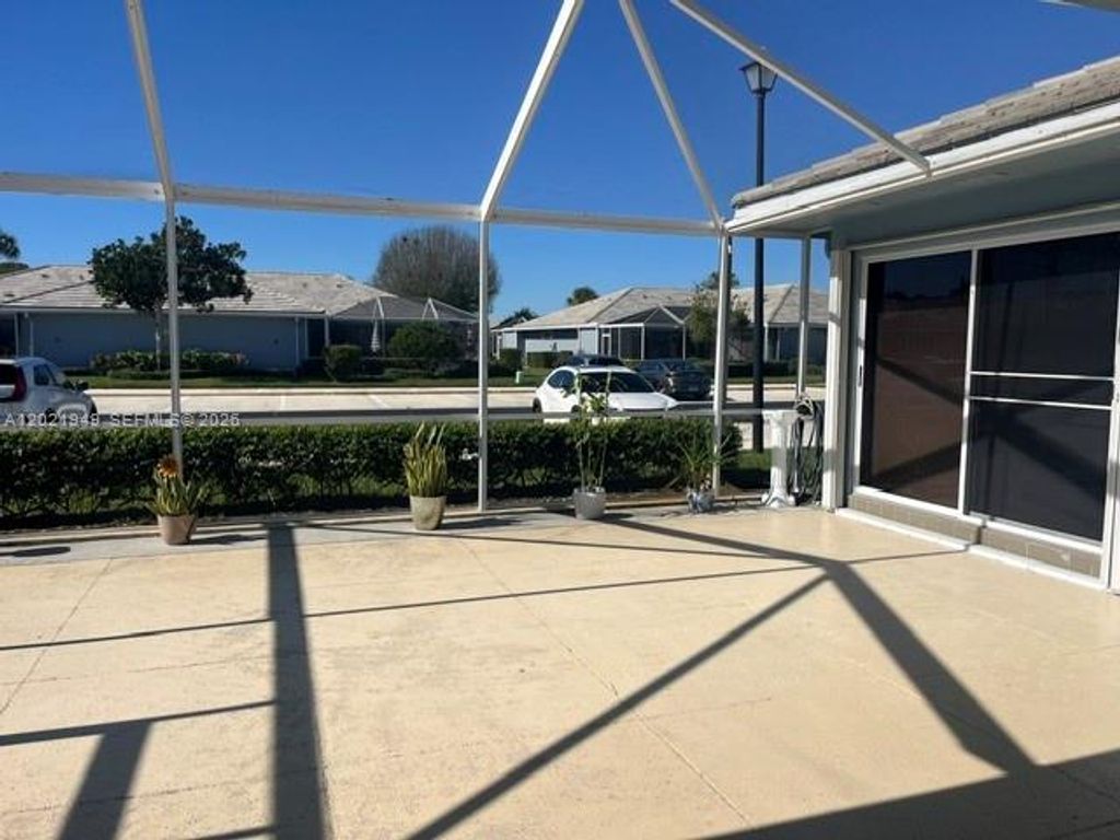 Photo of 1215 NW Sun Terrace Cir, Port St Lucie, FL 34986 (MLS # A12021949)