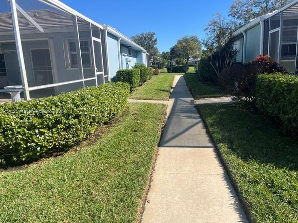 Photo of 1215 NW Sun Terrace Cir, Port St Lucie, FL 34986 (MLS # A12021949)