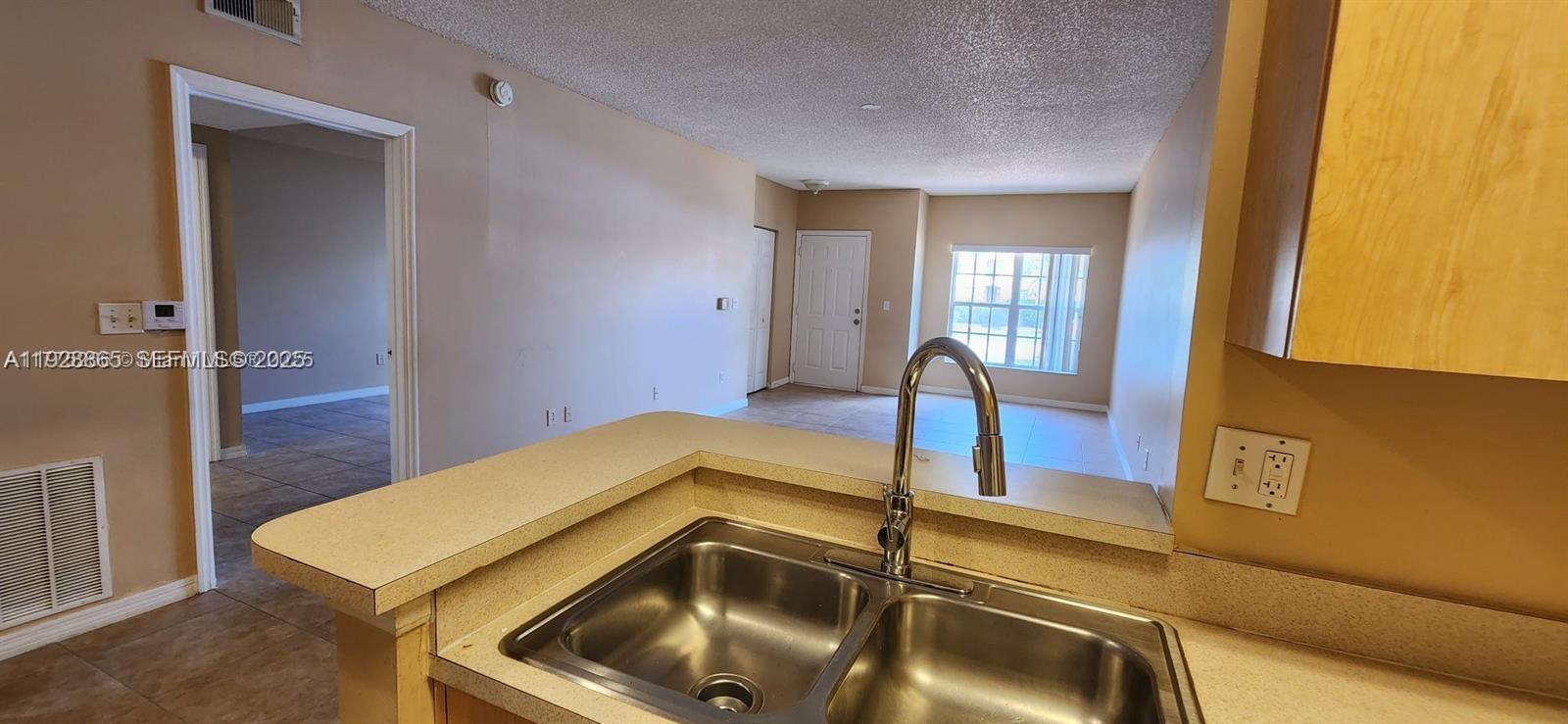 SPA AT SUNSET ISLES CONDO - Residential Lease