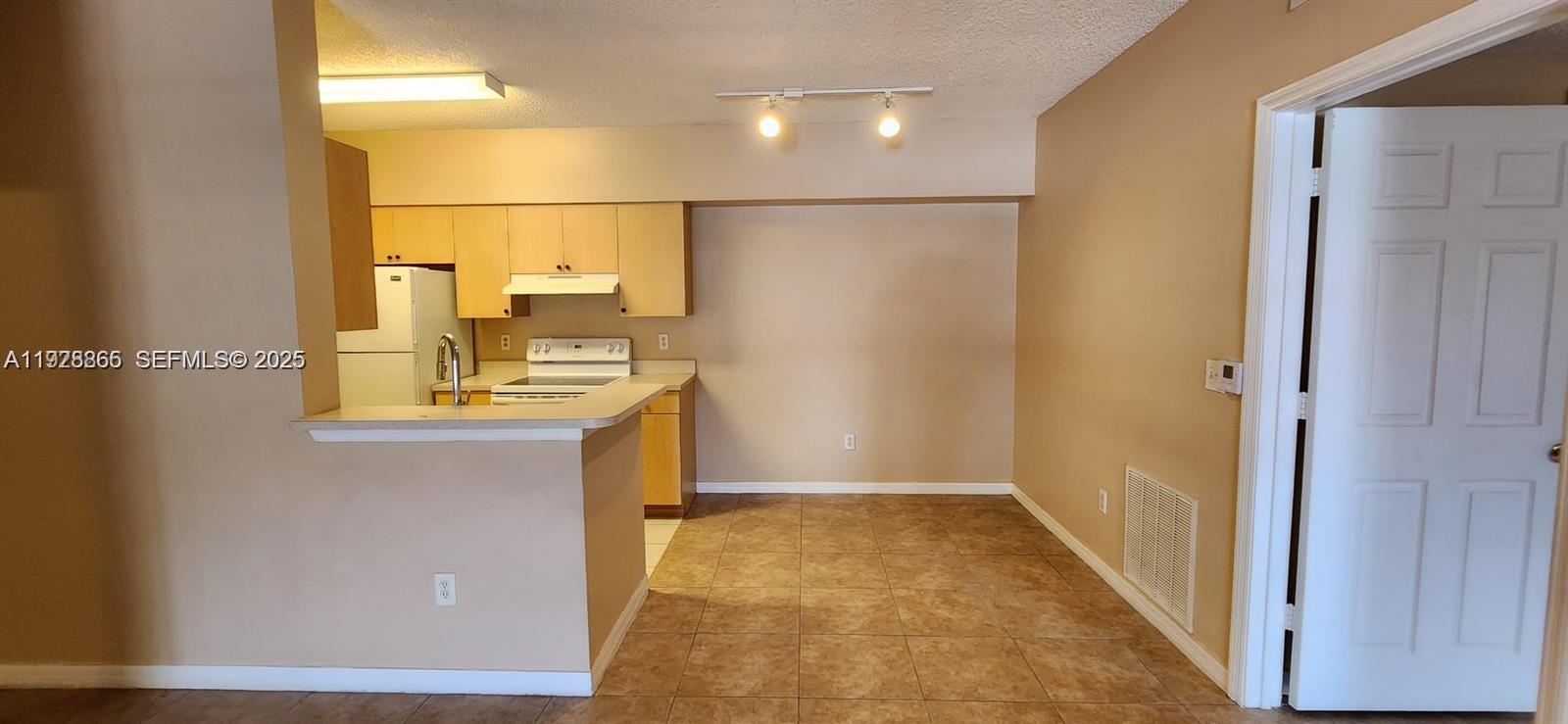 SPA AT SUNSET ISLES CONDO - Residential Lease