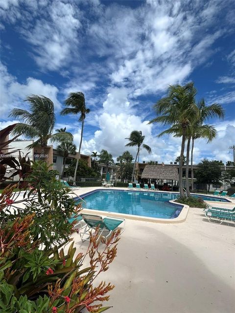 Photo of 8261 SW 128th St #202, Pinecrest, FL 33156 (MLS # A11941662)