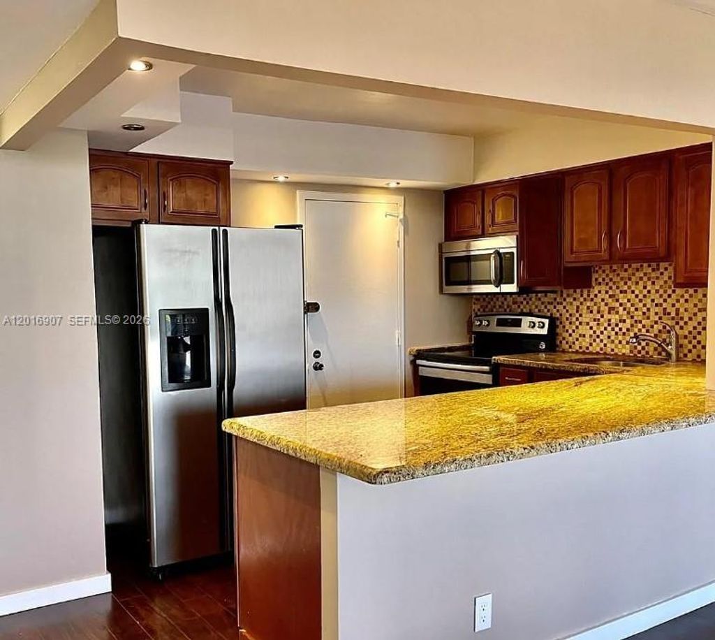 Photo of 600 Three Islands Blvd #304, Hallandale Beach, FL 33009 (MLS # A12016907)