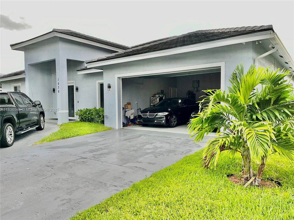 Photo of 3838 NW 5th Ct, Lauderhill, FL 33311 (MLS # A11836546)