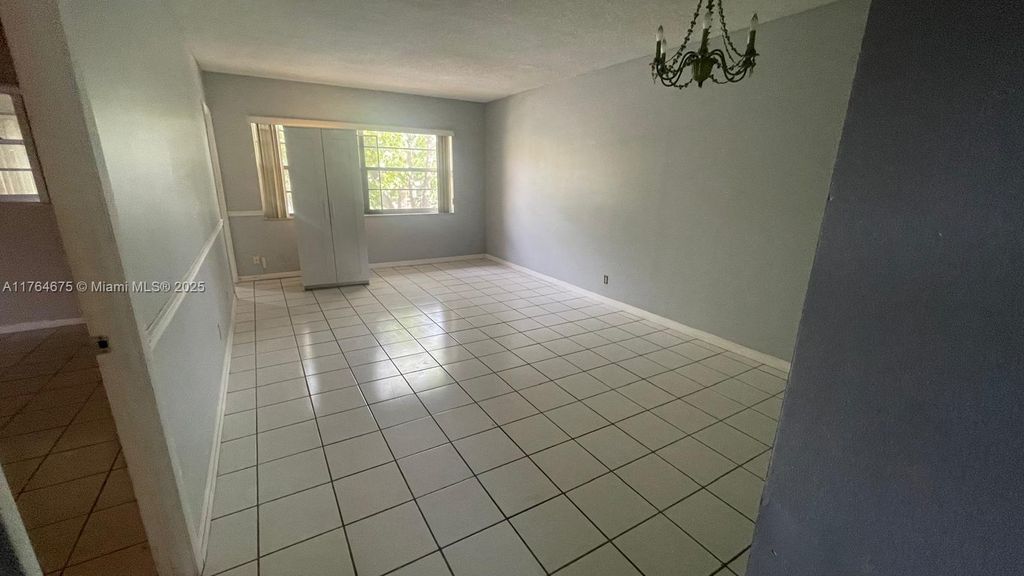 Photo of 5061 W Oakland Park Blvd #307, Lauderdale Lakes, FL 33313 (MLS # A11764675)