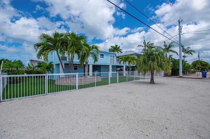 Waterfront retreat with excellent boating access in the heart of Big Pine Key! Home has 15k boat lift, fish cleaning table and clear deep canal. This elevated home features a private dock, canal frontage, and plenty of room for boats, trailers outdoor entertaining and out door showers. Open-concept living areas, abundant natural light, and spacious porches create the perfect Keys getaway or full-time residence. Conveniently located near world-class fishing, diving, turquoise blue waters, sandbars and the Lower Keys’ laid-back charm. 4 bedrooms, 3 baths, there are 2 bedrooms and 1 bath upstairs and 2 bedrooms, 2 baths downstairs. Home is fully furnished and ready to use.