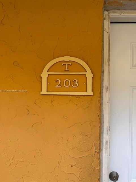 Photo of 17901 NW 68th Ave #T203, Hialeah, FL 33015 (MLS # A11871803) Photo of 17901 NW 68th Ave #T203, Hialeah, FL 33015 (MLS # A11871803)