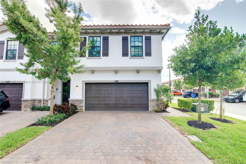 Photo of 1019 Sweet Briar Ln, Riviera Beach, FL 33410 (MLS # A11471871)