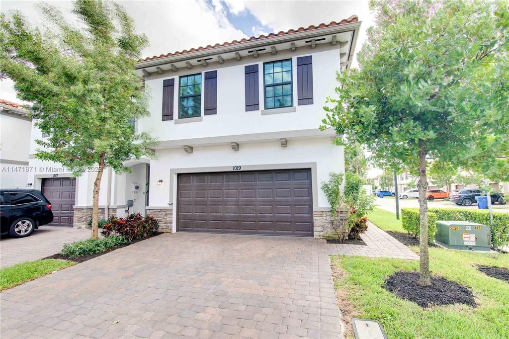 Photo of 1019 Sweet Briar Ln, Riviera Beach, FL 33410 (MLS # A11471871)