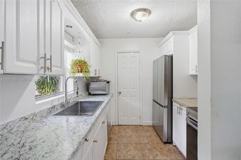 Tiny photo for 7811 SW 9th St, North Lauderdale, FL 33068 (MLS # A12012365)