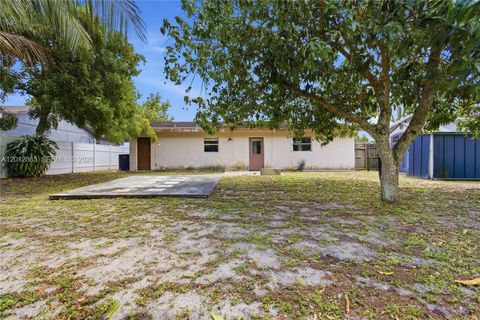 Tiny photo for 7811 SW 9th St, North Lauderdale, FL 33068 (MLS # A12012365)