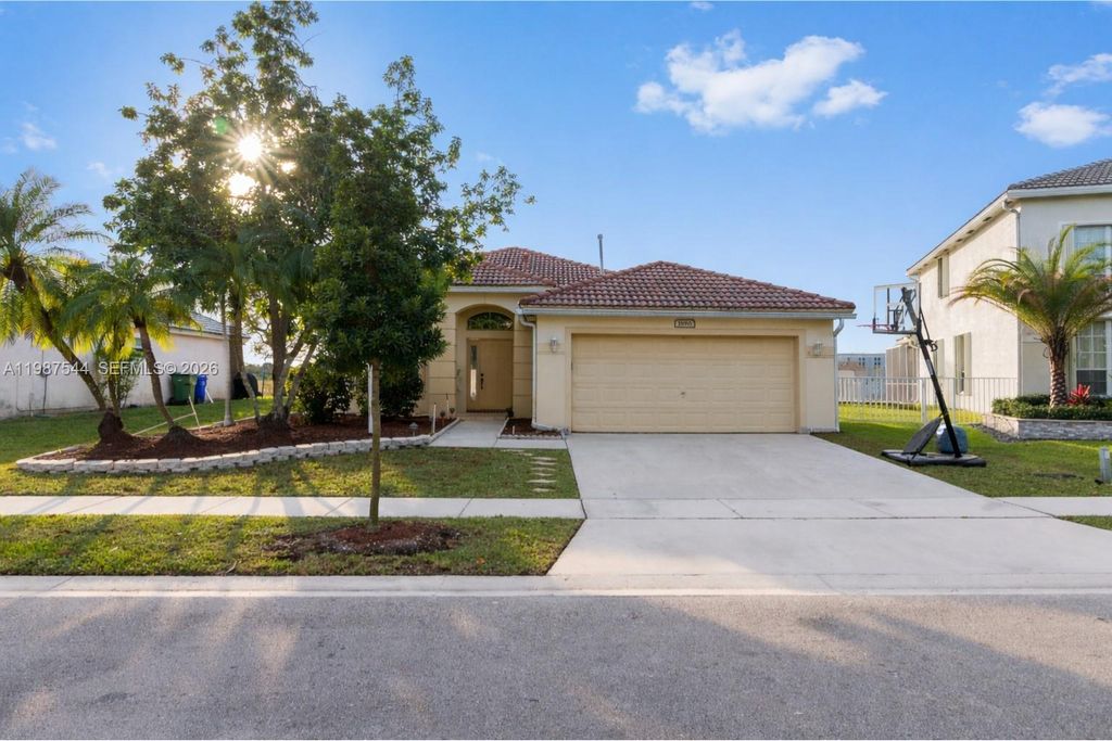 Photo of 1886 NW 145th Ter, Pembroke Pines, FL 33028 (MLS # A11987544)