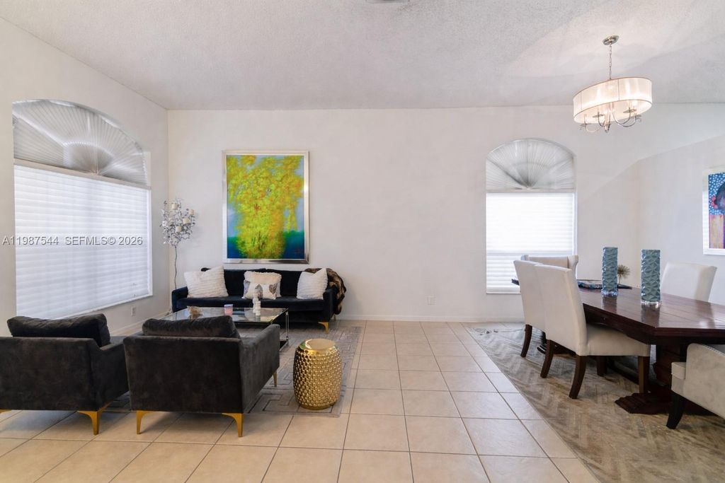 Photo of 1886 NW 145th Ter, Pembroke Pines, FL 33028 (MLS # A11987544)