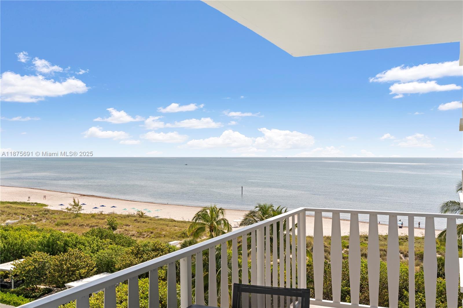 Experience the essence of island living in this spacious one-bedroom, one-bathroom peaceful hideaway located directly on the beach. Situated on the second line from the water, this residence offers direct, unobstructed views of the beach & ocean. The open floor plan integrates living & dining areas, designed to capture the surroundings while allowing for gracious entertaining. A spacious balcony extends the living space outdoors, where ocean breezes create a tranquil daily backdrop. Enjoy coastal living in an exclusive full-service waterfront co-op w/private beach access. Just a bridge away from Miami, Key Biscayne—flanked by two expansive parks—offers pristine beaches, outdoor activities, fine dining, boutique shops, and a secure community atmosphere, delivering a truly unique lifestyle.