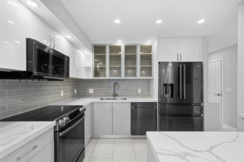 Photo of 701 Three Islands Blvd #411, Hallandale Beach, FL 33009 (MLS # A11985408)