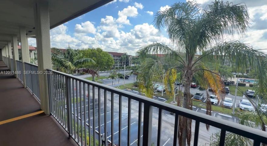 Enjoy peaceful lakefront living in this bright and inviting residence located in a desirable 55+ community. This well-maintained condo features an open-concept kitchen that flows seamlessly into the living and dining areas, creating a comfortable space for both everyday living and entertaining.

The home offers tile flooring throughout, providing a clean and low-maintenance feel. Impact windows in the living room add peace of mind while allowing natural light to fill the space and showcase beautiful lake views, enhancing the sense of tranquility.

Residents enjoy access to an impressive array of amenities, including indoor and outdoor pools, fitness centers, tennis and pickleball courts, golf, a theatre room, billiards, and a guarded entrance with security patrol. A community shuttle is also available for added convenience.

Ideally located near shopping, dining, major highways, and airports, this community offers both comfort and accessibility. The monthly HOA fee includes water, cable, and internet, adding excellent value to this move-in ready property.