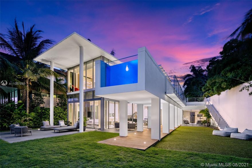 Live in your own private paradise! This home is a true gem and one not to be missed. Exquisite 4 bedroom, 5.5 bathroom designed by notable designer, Peter Bohlin. No detail was left out between the guest wing, exterior lounge spaces, spacious master bedroom and more. A 23 yard lap pool is certainly a significant feature of its own, especially to accommodate the 100ft of water frontage the home sits on. Take advantage of the large sliding doors and enjoy SE sea breezes in both living and sleeping areas.