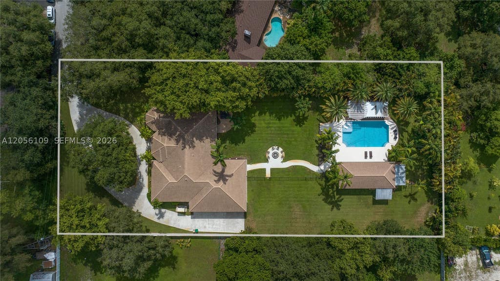 Photo of 11070 SW 52nd Ct, Davie, FL 33328 (MLS # A12056109)