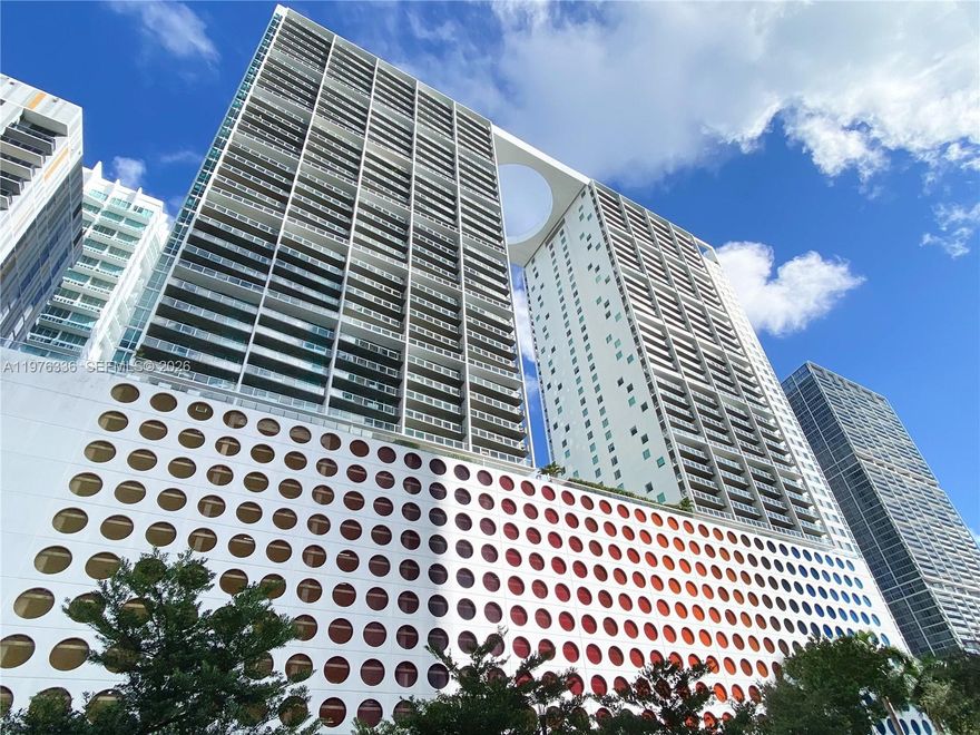 Well maintained 2 bed/2 bath in desirable 500 Brickell. Unit features: European kitchen with wood cabinets, stainless steel appliances, marble baths, and balcony overlooking the downtown skyline; bldg. features advancee technology "smart bidg.", pools, sport bar with plasma tv's, billiard, fitness center, male and female spas, sauna, steam room, Jacuzzi, top floor pool/party room & bar and much more. Brand new carpet installed. Centrally located close to financial center, restaurants, bars, Brickell Mary village. Parking space number 6038. Basic cable and internet provided by the condo association.