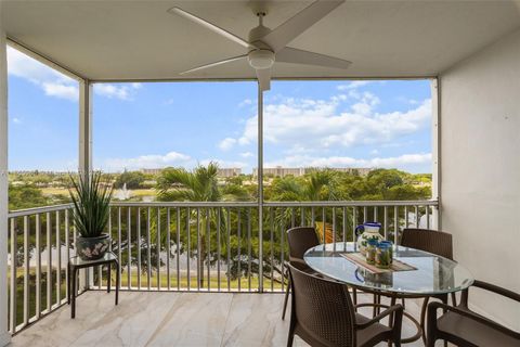 Photo of 3150 N Course Ln #402, Pompano Beach, FL 33069 (MLS # A11865985)