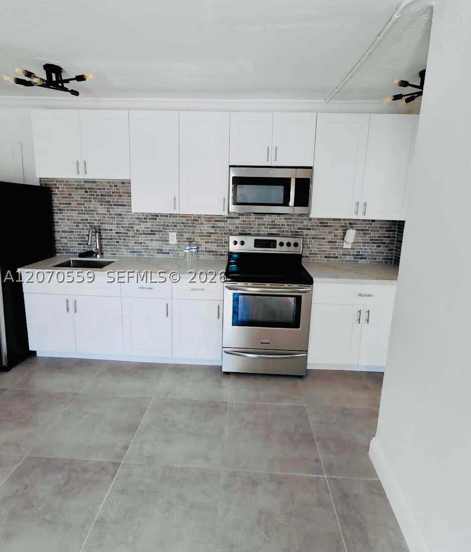 Photo of 308 NW 2nd Ave #S, Deerfield Beach, FL 33441 (MLS # A12070559)