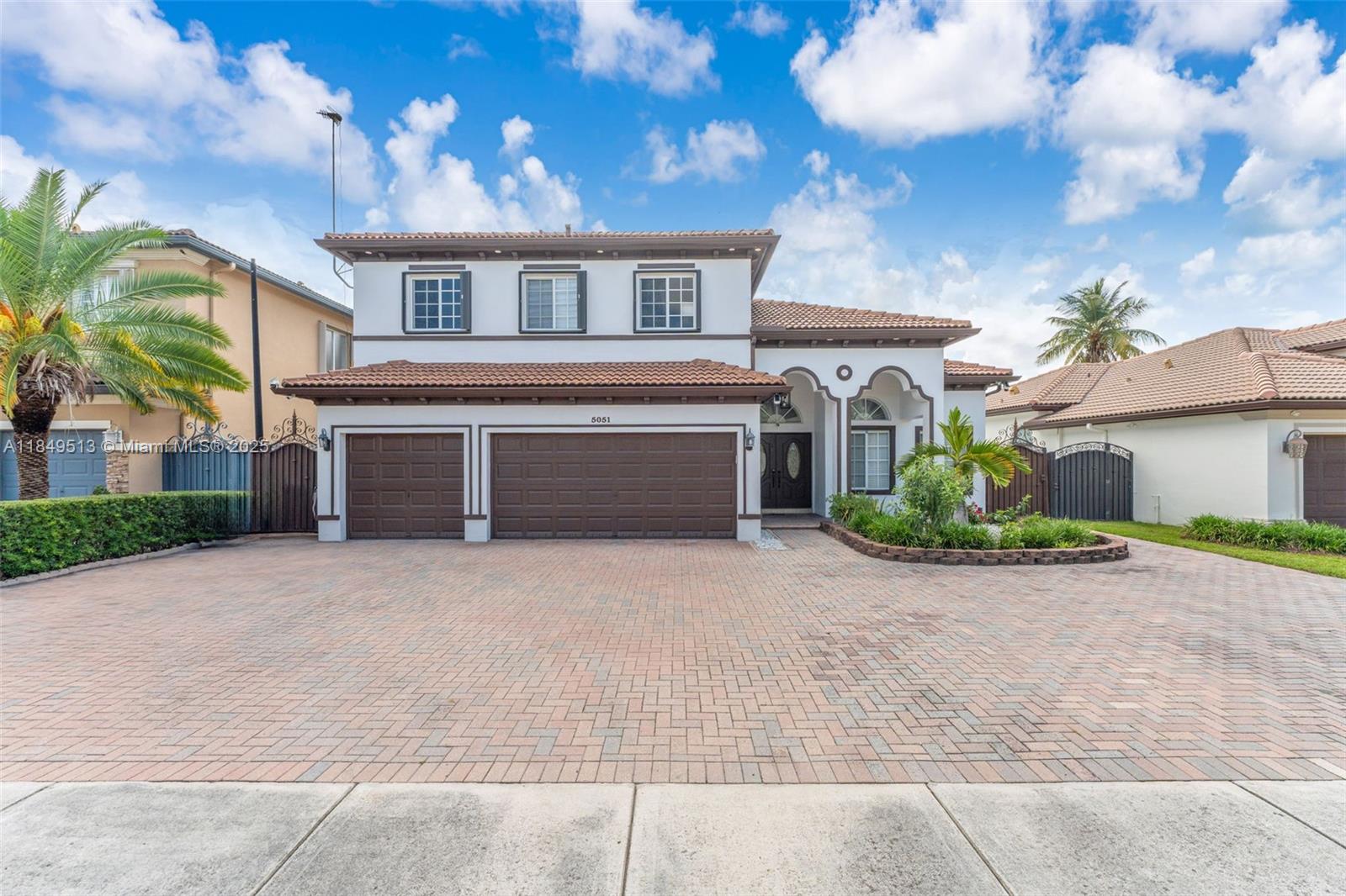 NO HOMEOWNERS ASSOCIATION! Welcome home to this spacious 4-bed, 3-bath pool-home with an expansive driveway and 3 car garage! Inside the home you'll find a generous living area of nearly 2,800 square feet! This includes a chef’s kitchen with center island, open living areas, and a convenient full bedroom and full bathroom on the first floor. Enjoy tile and wood floors throughout and high ceilings! Step outside to your private fenced in backyard oasis featuring a beautiful pool, jacuzzi, private kitchen and bar — perfect for entertaining or relaxing year-round. Located in a quiet neighborhood and close to top-rated schools, shopping, and highways—this property is the ideal South Florida home! View it and live your dream today!