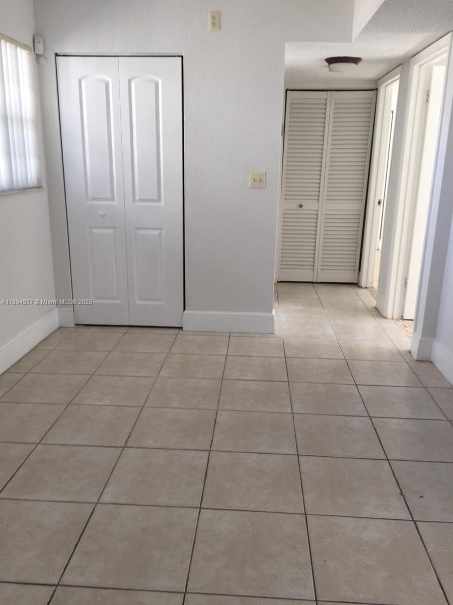 Beautiful 2-bedroom, 1-bath Penthouse condo with a private balcony located in the desirable Falls area. Features elegant marble floors, granite countertops, and fresh paint throughout. Excellent location close to top-rated schools, shopping, dining, and major highways.