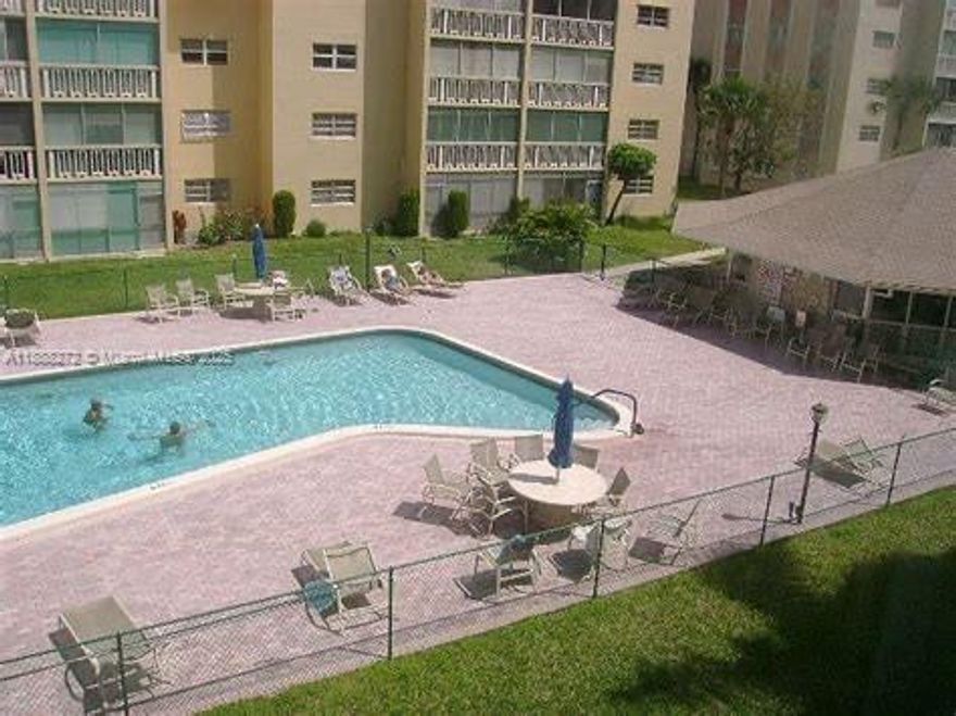 Very bright and large apartment at the Meadowbrook Condo.It is 2 bedrooms, 2 bathrooms plus den. The unit has a new tile floor throughout. The balcony is converted to a large patio that can be used as an extra space for an office or room. The bedroom has large walk in closet. There is an extra personal storage and laundry room on every floor within close range of the unit. The community allows only 55 and older members. Water is included in monthly maintenance fees. There is also a heated pool, sauna, small gym and club house. Short distance to shops, restaurants and short distance to beautiful Hallandale beaches.