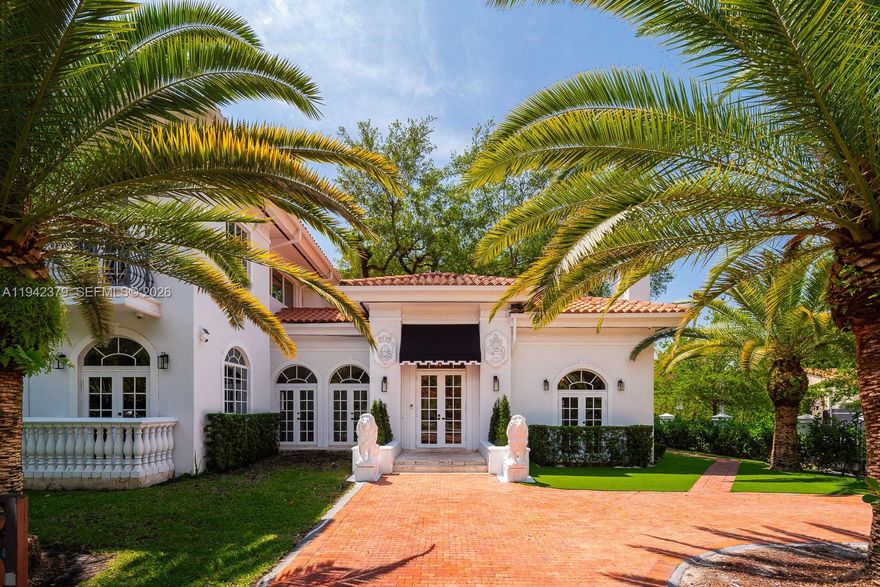 Built in 2003 this Mediterranean style 2 story home is incredibly spacious, light and bright with an A+ address just steps to the Biltmore Hotel, Salvadore Park and the Venetian Pool. This close to 5000 square foot home has 14' tall ceilings and tall Palladian windows that bring in the light and create a sense of wide-open airiness throughout. All major rooms open with French doors to a charming, spacious courtyard presided over by a magnificent, ancient oak tree at its center.  The 13,875 square foot lot is walled and gated. The 2nd floor primary bedroom suite measures 24'X20' and has 2 huge walk-in closets. There are 3 other bedrooms upstairs and 1 bedroom down plus a maid's bedroom & bath plus 2 offices. Foyer, formal living rm, family room, formal dining room, pool, 2 car garage. Floor plan available.