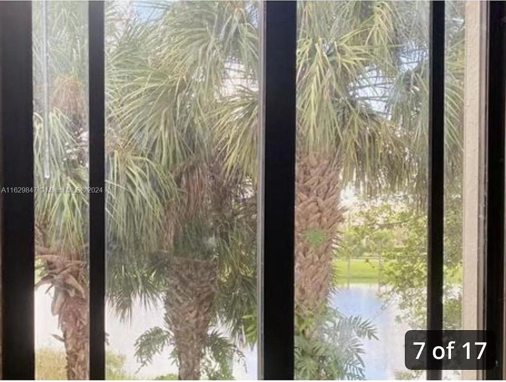 Photo of 3023 Alcazar Pl #201, Palm Beach Gardens, FL 33410 (MLS # A11629847)