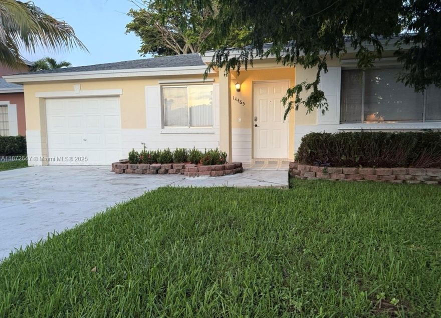 This charming home features an open-concept living and dining area, a fully equipped kitchen with stainless steel appliances, a large master suite with a private bathroom, two additional bedrooms with closets, in-unit washer and dryer, and a one-car garage.