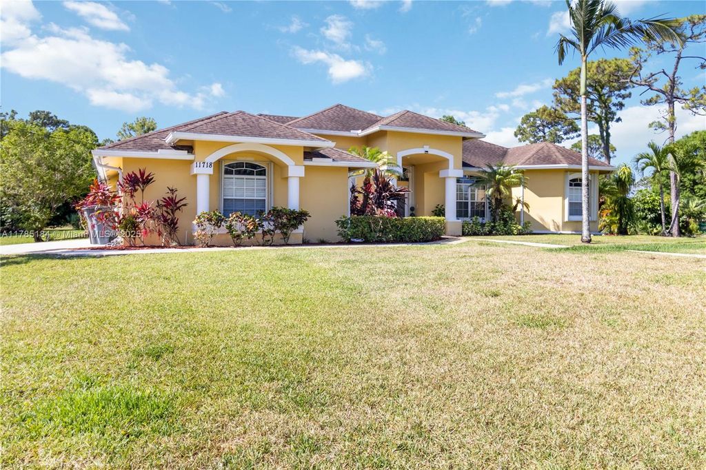 Photo of 11718 63rd Ln, West Palm Beach, FL 33412 (MLS # A11785184)