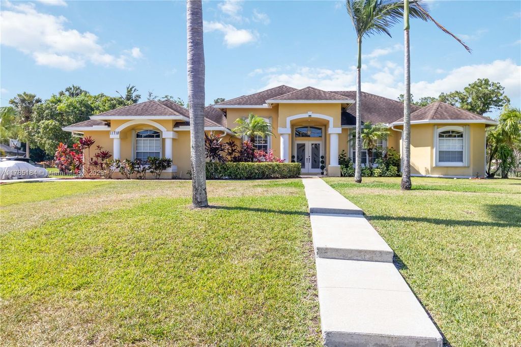 Photo of 11718 63rd Ln, West Palm Beach, FL 33412 (MLS # A11785184)