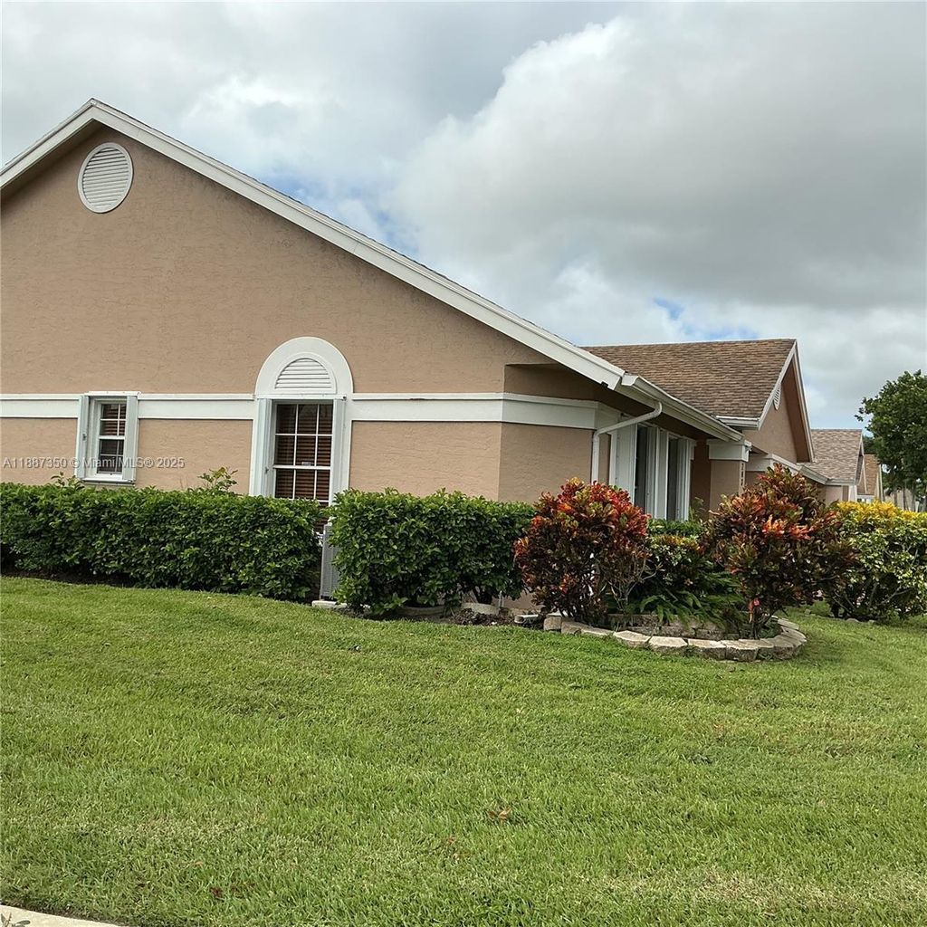 Photo of 203 N Moccasin Trl N, Jupiter, FL 33458 (MLS # A11887350)