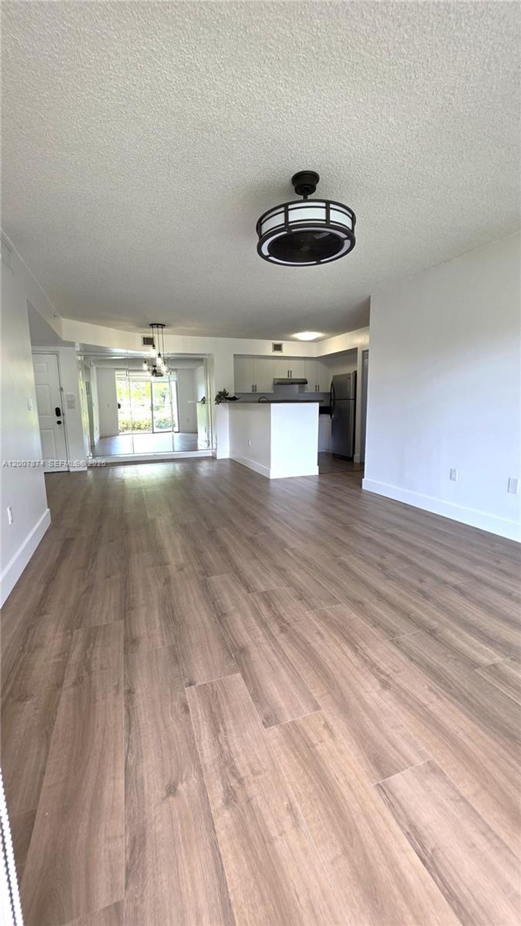 Photo of 12136 Saint Andrews Pl #108, Miramar, FL 33025 (MLS # A12007874)