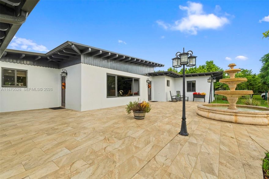 Welcome to your private Miami oasis! This stunning single-family home sits on a 1-acre corner lot, offering 4 bedrooms, 3 full baths, and an inviting updated pool. Enjoy a multi-sport court for tennis, pickleball, and basketball, plus mature fruit trees, a tranquil fountain, and full fencing for privacy. Inside, bright open spaces feature a cozy fireplace and a kitchen with stainless steel appliances. A 2 car garage plus space in the yard to park your RV or boat adds versatility. With space to build a guest house, this home offers immediate comfort and future potential. Located minutes from Dadeland, Baptist Hospital, South Miami Hospital, and major expressways, this is resort-style living in a prime location.