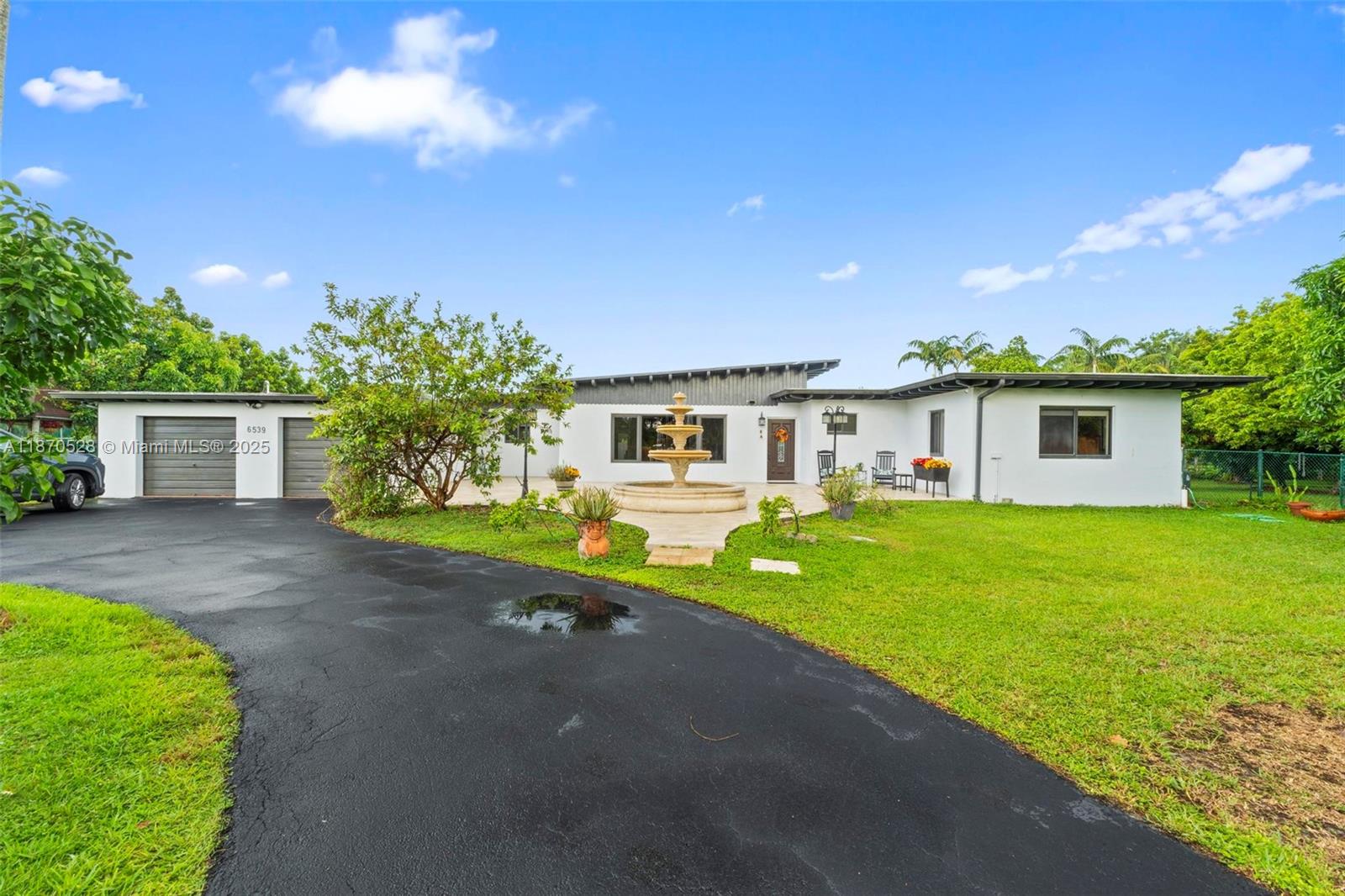 Welcome to your private Miami oasis! This stunning single-family home sits on a 1-acre corner lot, offering 4 bedrooms, 3 full baths, and an inviting updated pool. Enjoy a multi-sport court for tennis, pickleball, and basketball, plus mature fruit trees, a tranquil fountain, and full fencing for privacy. Inside, bright open spaces feature a cozy fireplace and a kitchen with stainless steel appliances. A 2.5-car garage plus room to park your RV or boat adds versatility. With space to build a guest house, this home offers immediate comfort and future potential. Located minutes from Dadeland, Baptist Hospital, South Miami Hospital, and major expressways, this is resort-style living in a prime location.