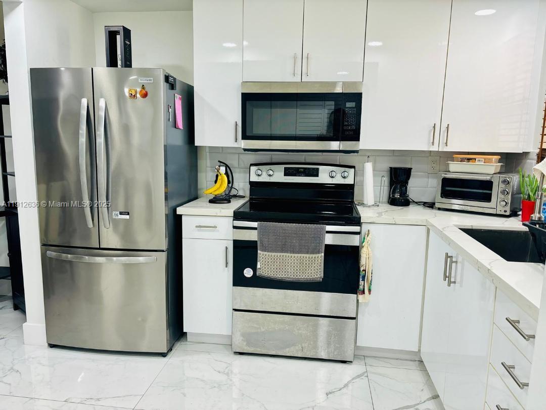 SUNRISE LAKES 61 CONDO - Residential