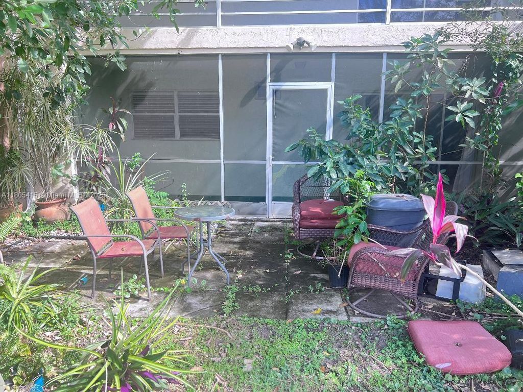 Photo of 10693 N Military Trl #7, Palm Beach Gardens, FL 33410 (MLS # A11805415)