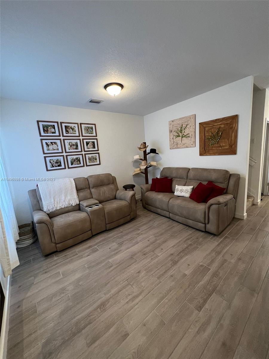 Beautifully maintained like new 3/2.5 townhome in Seascape. Recent upgrades include: tankless water heater (great for energy savings), cement patio with built in fire pit for entertaining, additional interior storage area. Home is the pride of ownership and immaculately maintained. Community is gated and offers community pool, dog park, security and playground. Minutes to the Turnpike and shopping.