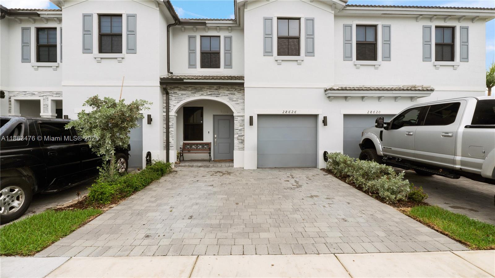 Lowest priced 4 bedroom townhome in the neighborhood! This spacious townhome stands out as the best value in the community, featuring an open concept layout filled with natural light. Built in 2022 with a modern kitchen that showcases sleek finishes and opens to a private patio, perfect for outdoor enjoyment. Impact windows and doors provide peace of mind. The first floor offers a versatile bedroom with a full bath, ideal for guests or a home office. Upstairs, the owner’s suite includes an ensuite bath, while two additional bedrooms boast walk-in closets. A convenient upstairs laundry completes the home. Located outside of a flood zone. Easy to show. Owner is highly motivated! 100% FHA available!
