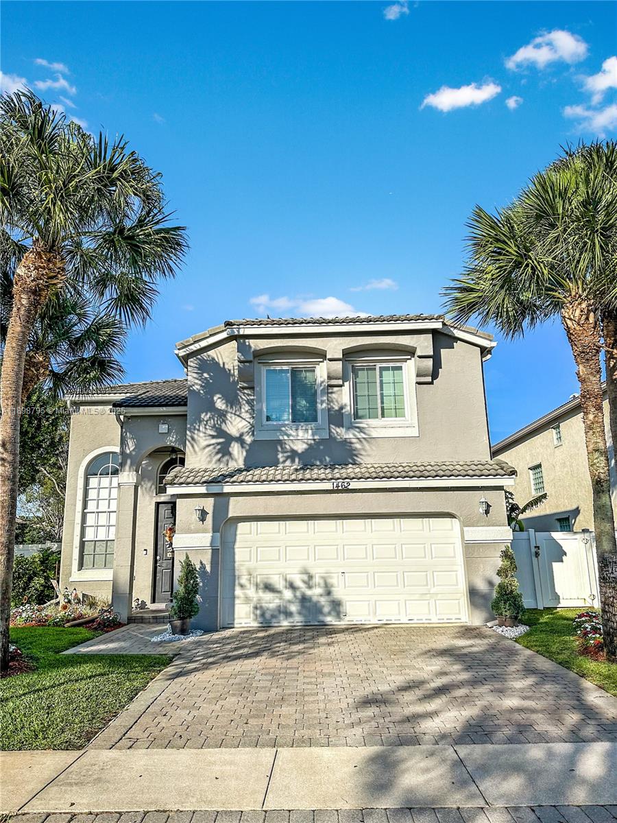 This beautiful 4-bedroom/2.5 bathroom home is located in the desirable community Madison Green. Home features: impact windows upstairs, hurricane shutter panels for downstairs, keyless front door entry, ring door bell, external cameras, outdoor speakers in patio, electric panel for portable power & rainsoft whole house water filtration system. Water heater cooktop & dishwasher recently replaced. Corner Cul-De-Sac Lot! This fully fenced lot is one of the largest in Pinehurst and has room for a pool. Enjoy outdoor living in your private oasis. Home features a covered and screened patio. Madison Green is renowned for its resort style living with beautiful surroundings and convenient location. Lots of amenities and basic cable & internet included.