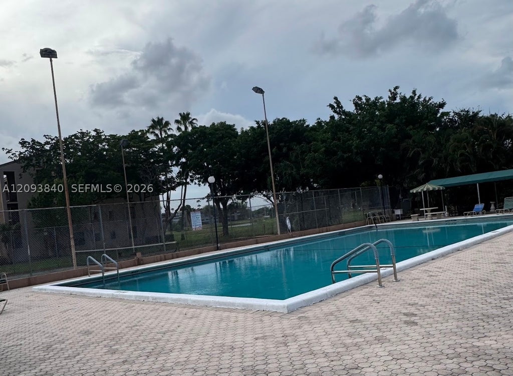 Photo of 7591 NW 1st St #403, Margate, FL 33063 (MLS # A12093840)