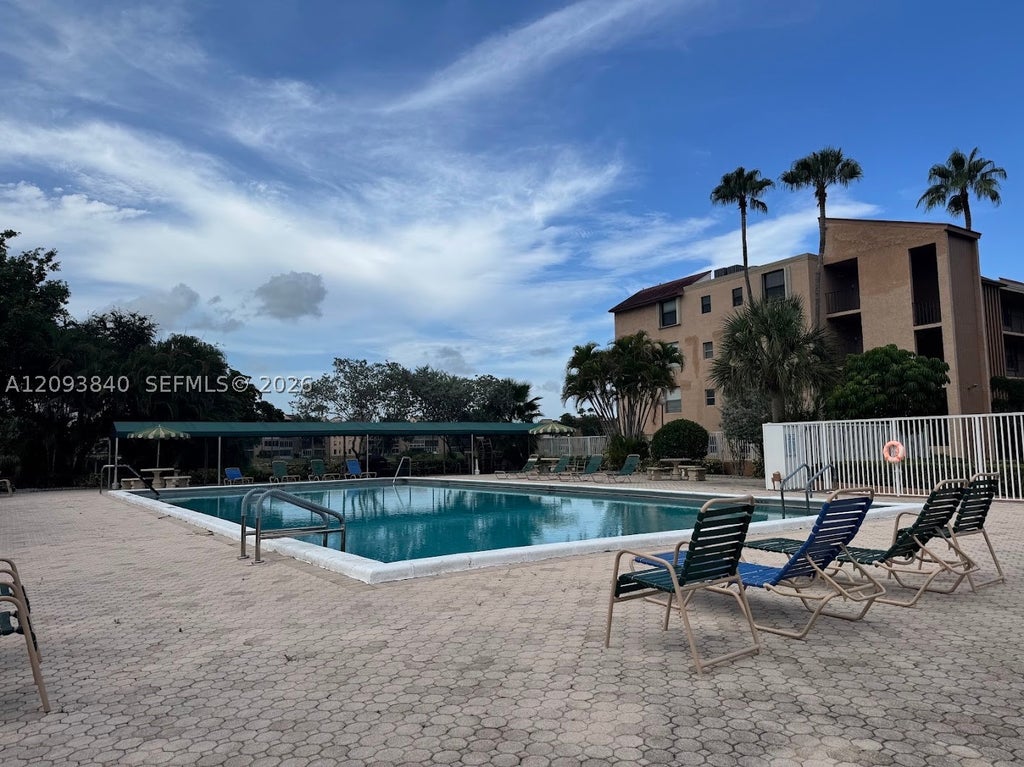 Photo of 7591 NW 1st St #403, Margate, FL 33063 (MLS # A12093840)