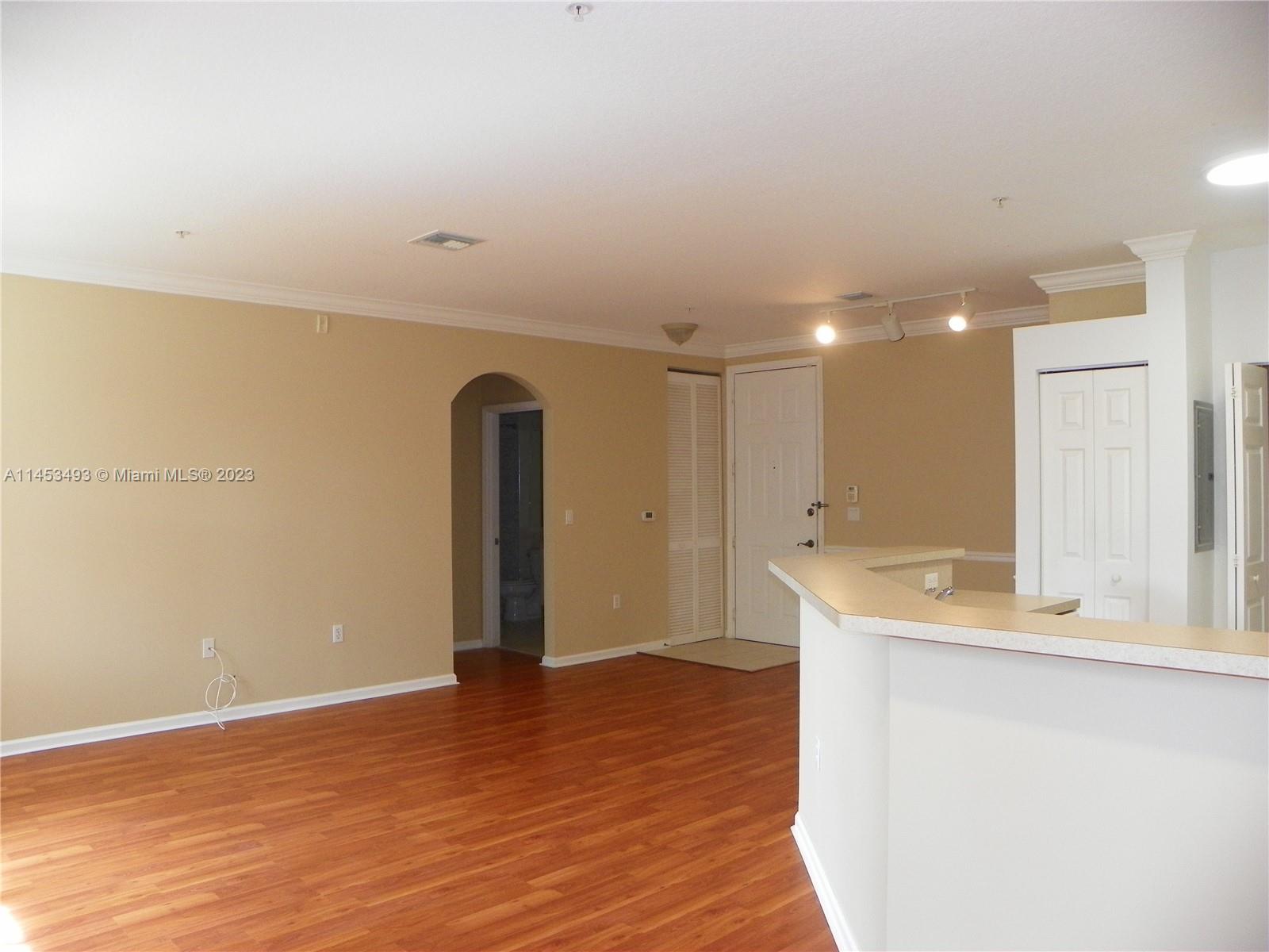 See this beautiful & spacious 1 bedroom/1 bath condo at El-Ad Villaggio in Miramar. This cozy unit is on the first floor. Building is next to Clubhouse for convenience (Pool, Gym, etc). Comfortable living-dining area, ample
kitchen, full-size washer & dryer, a large walk-in closet in the master bedroom, laminate flooring. Gated
community. On-Site management, plenty of parking spaces, a Mediterranean-style clubhouse, gym, lagoon-style
pool overlooking a beautiful lake. Very well located, close to I-75, Plenty of restaurants, supermarkets, bakeries,
shopping, banks nearby. Available on October 1st. Currently Occupied.