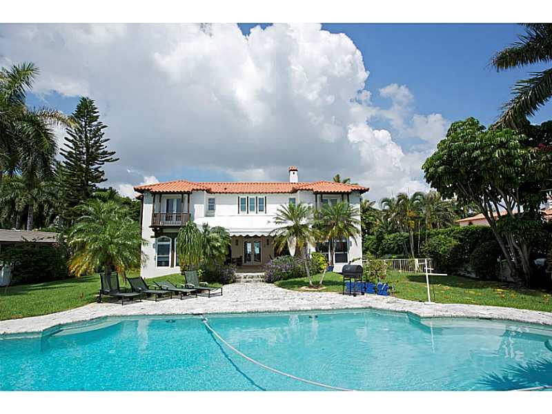 Historic Mediterranean estate located in exclusive gated Morningside community! This newly renovated property offers wide bay unobstructed views with eastern exposure and spectacular Sunrise with lush landscape in a private, walled oasis. This property a lso features spacious rooms, hardwood floors, and chef's kitchen with Viking appliances, heated pool, hot tub with waterfall, impact glass, fireplace, large dock with boatlift, separate 2 story guesthouse and a huge covered patio facing the open bay.