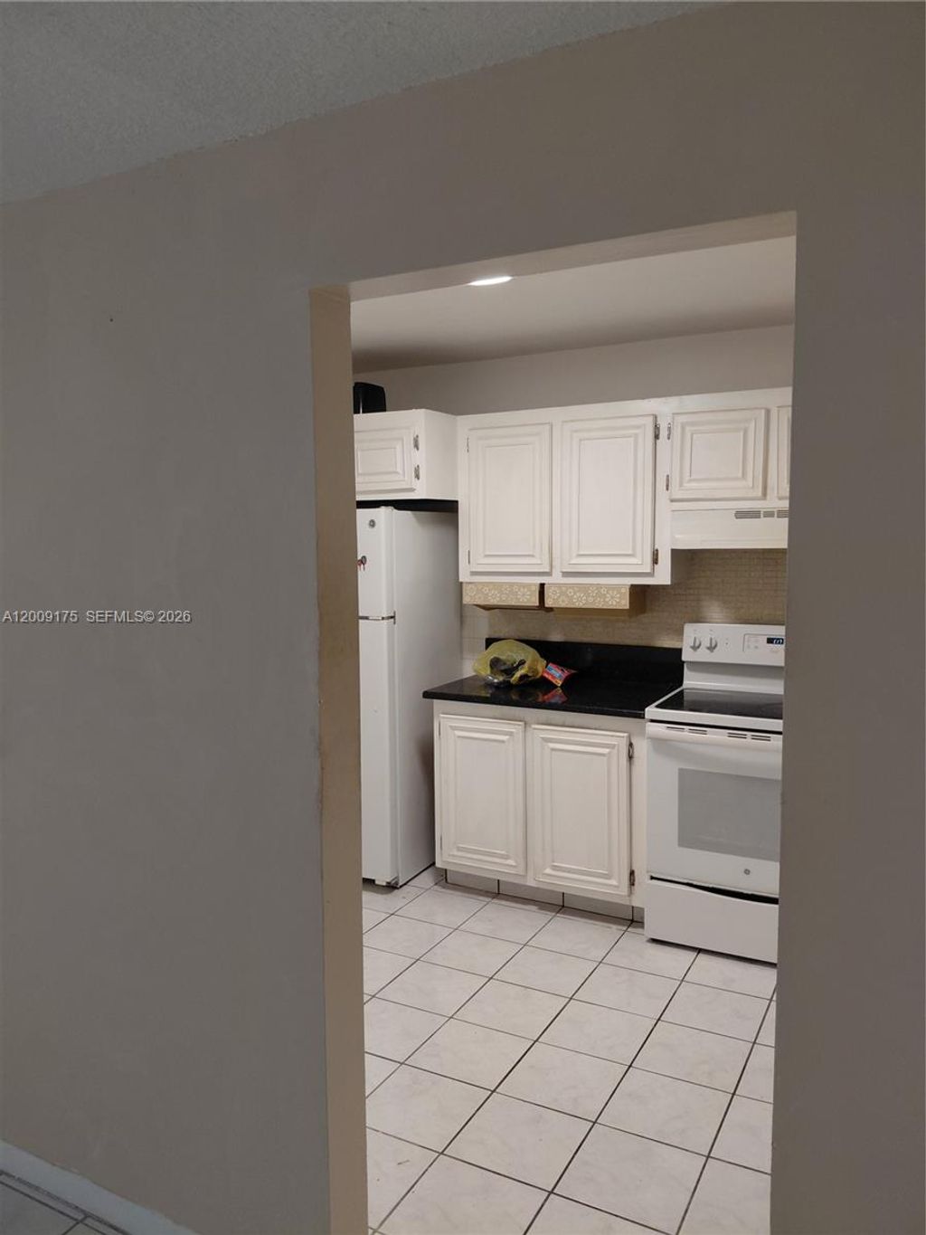 Photo of 4047 NW 16th St #109, Lauderhill, FL 33313 (MLS # A12009175)